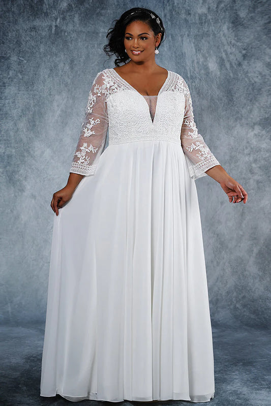 Michelle Bridal For Sydney's Closet MB2020 A-Line Deep V-Bodice With Illusion Mesh Insert Pleated chiffon skirt Chapel Train Unique Embroidered Design On Bodice And Lace Appliques On Illusion Sleeves Plus Size "Corrine" Bridal Gown. Fall in love with the unique look of the Michelle Bridal For Sydney's Closet MB2020 A-Line bridal gown. This plus size design features a deep V-bodice with illusion mesh insert, pleated chiffon skirt, and chapel train. 