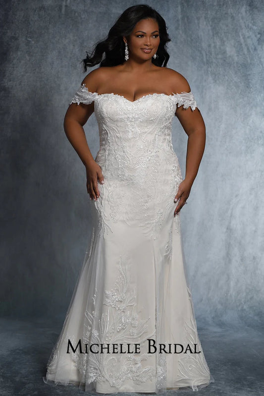 The Michelle Bridal for Sydney's Closet MB2117 is a stunning plus-size bridal gown featuring a strapless sweetheart neckline, lace-up back, and fitted silhouette adorned with floral appliques and pearls. Made with sequins for added sparkle, this striking gown will be sure to make any bride's special daydream come true.