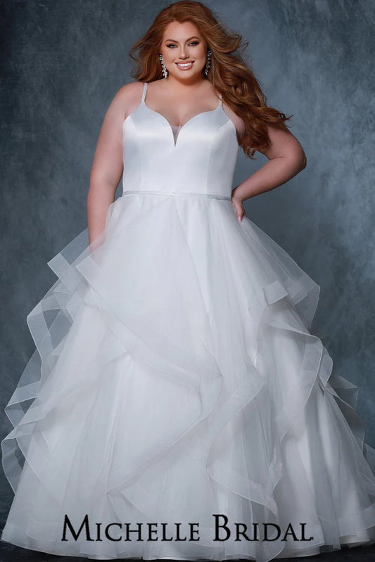 Michelle Bridal For Sydney's Closet MB2207 A-Line Silhouette Sweetheart Neckline Satin bodice Satin Straps And Belt Soft Tulle Layered Tiers With Horsehair Hem Plus Size "Jolie" Bridal Gown. Be the vision of beauty in this Michelle Bridal for Sydney’s Closet Plus Size “Jolie” Bridal Gown. It features a classic a-line silhouette with sweetheart neckline, satin bodice and straps, and a belt. The skirt consists of soft tulle layered tiers with a horsehair hem, creating an enchanting look. 