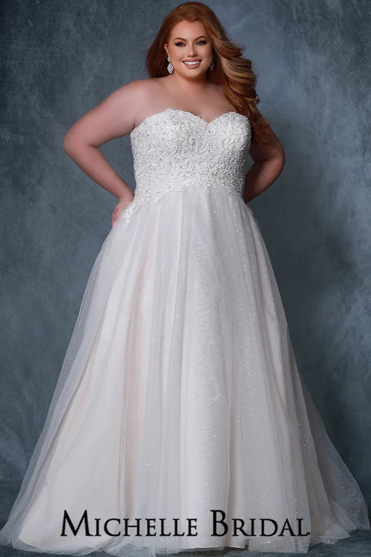 Michelle Bridal For Sydney's Closet MB2211 Ballgown Silhouette Sweetheart Neckline Strapless Optional Off The Shoulder Straps Modified Empire Lace Up Back Plus Size "Valerie" Bridal Gown. Make your special day perfect with this stunning plus size "Valerie" bridal gown from Michelle Bridal for Sydney's Closet. This beautiful gown features a ballgown silhouette, sweetheart neckline, strapless design, and optional off-the-shoulder straps. It offers a modified empire waist and a lace up back for a perfect fit.