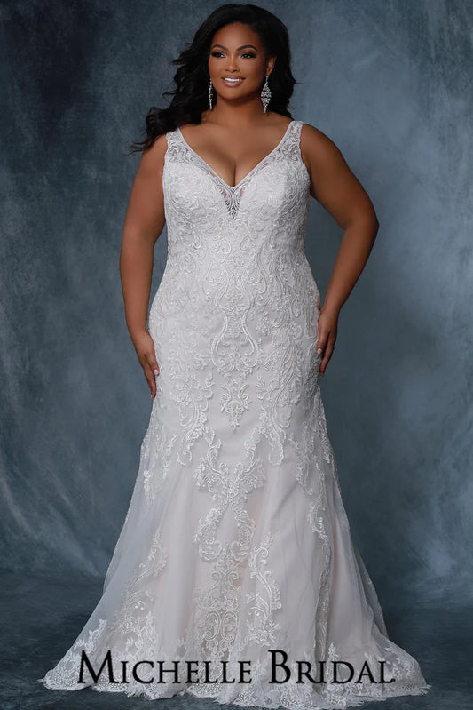 Michelle Bridal For Sydney's Closet MB2212 Mermaid silhouette V-Neckline Illusion Straps With Beaded Lace Bridal Tulle Embroidered Lace Bugle Beads Clear Sequins Plus Size "Giselle" Bridal Gown. This gorgeous "Giselle" bridal gown features a mermaid silhouette, V-neckline, illusion straps, beaded lace, and bridal tulle. It's embroidered with stunning lace, bugle beads, clear sequins, and is available in plus sizes. An ideal gown for any spectacular day.