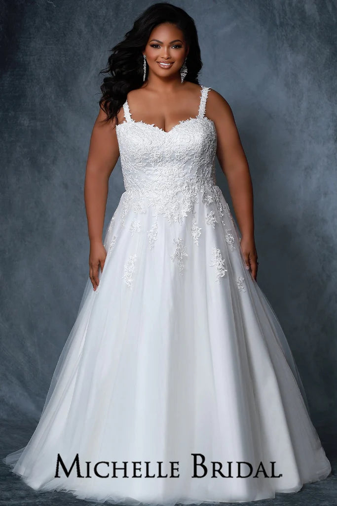 Michelle Bridal For Sydney's Closet MB2219 A-Line Silhouette Strapless Optional Straps Covered In Lace To Match Bodice Sweetheart Neckline Beaded Center Front Bodice Lace Up Back Plus Size "Yvonne" Bridal Gown. Walk down the aisle in this stunning plus size "Yvonne" bridal gown from Michelle Bridal for Sydney's Closet. It features an A-line silhouette with a beaded center front bodice, optional straps covered in lace to match the bodice, a sweetheart neckline, and a lace up back.