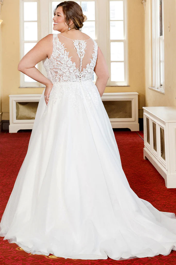 Michelle Bridal For Sydney's Closet MB2305 A-Line Floral Appliques Clear Sequins Bugle Beads Seed Pearls V-Neck Sleeveless Plus Size "Demi" Bridal. The Michelle Bridal MB2305 Bridal Gown brings the elegance of a V-neck sleeveless design with delicate floral appliques, clear sequins, bugle beads, and seed pearls. Crafted with a full A-Line skirt, this beautiful gown fits all body shapes. Look your absolute best on your special day with this plus size "Demi" gown.