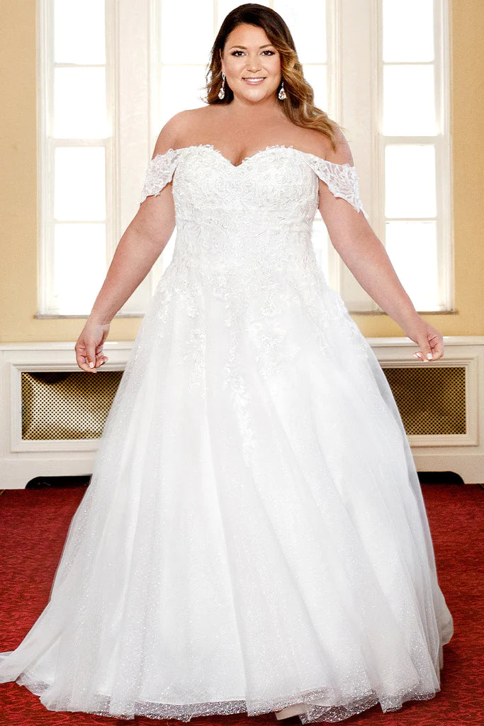Michelle Bridal For Sydney's Closet MB2313 A-Line Floral Lace Clear Sequins Clear Bugle Beads Lace Appliques On Soft Bridal Tulle Textured Glitter Net Satin Sweetheart Neckline Detachable Drape Sleeves Plus Size "Guinevere" Bridal Gown. Michelle Bridal's MB2313 "Guinevere" gown is perfect for the plus size bride. Featuring a flattering A-line shape, constructed with soft bridal tulle, glitter net, and satin; this dress is adorned with floral lace appliques, clear sequins, and bugle beads. 