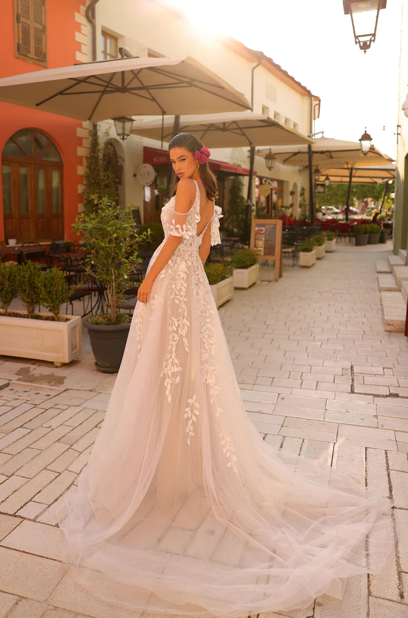 Amarra Bridal 84435 Morgan A-Line Ballgown Drape Lace Off The Shoulder Floral Train Wedding Gown. Morgan is a unique floral wedding dress for the free-spirited and non-traditional bride.