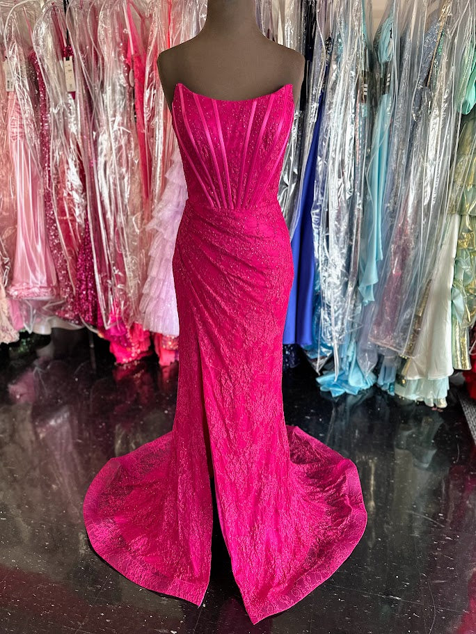 Elevate your formal occasion with the Nina Canacci 6646 prom dress, featuring a delicate long lace corset design in a striking magenta hue. This gown showcases a flattering scoop neckline and a tasteful slit, combining elegance with a hint of allure. it offers a refined silhouette perfect for making a memorable entrance.

Size: 0,&nbsp; 4

Color: Fuchsia