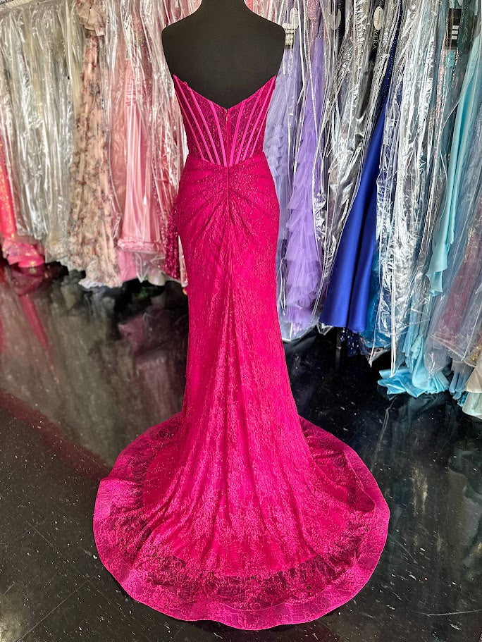 Elevate your formal occasion with the Nina Canacci 6646 prom dress, featuring a delicate long lace corset design in a striking magenta hue. This gown showcases a flattering scoop neckline and a tasteful slit, combining elegance with a hint of allure. it offers a refined silhouette perfect for making a memorable entrance.

Size: 0,&nbsp; 4

Color: Fuchsia
