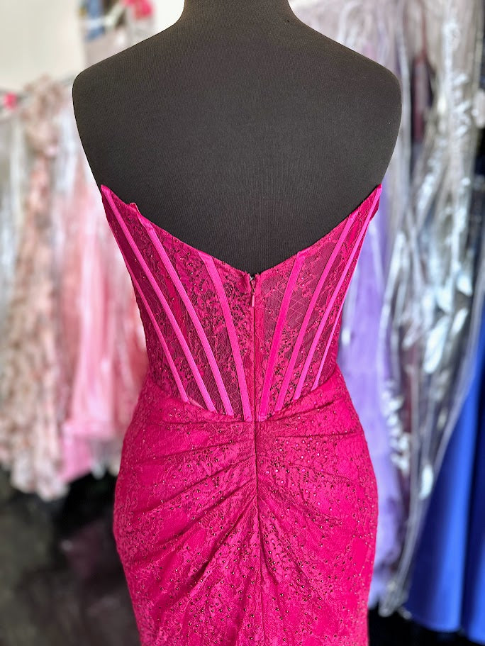 Elevate your formal occasion with the Nina Canacci 6646 prom dress, featuring a delicate long lace corset design in a striking magenta hue. This gown showcases a flattering scoop neckline and a tasteful slit, combining elegance with a hint of allure. it offers a refined silhouette perfect for making a memorable entrance.

Size: 0,&nbsp; 4

Color: Fuchsia