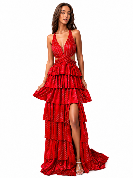 Nina Canacci's 9200 is a show-stopping pageant gown that combines elegance with contemporary flair. The crystal-layered jersey skirt features intricate micro crystal embellishments that catch light beautifully, while strategic side cutouts add modern sophistication. A dramatic maxi slit and flowing train create movement and grandeur, making this dress ideal for prom, pageants, and formal competitions. The jersey construction ensures comfortable wear throughout the evening while maintaining a polished silhou