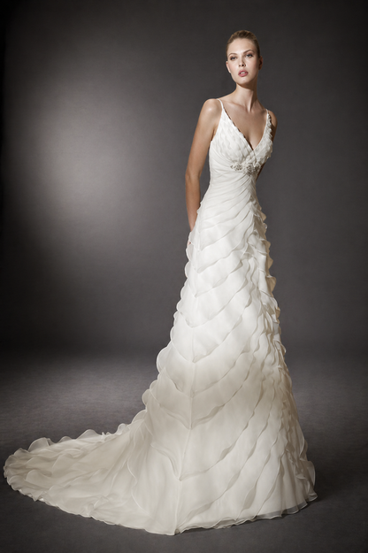 DESIGNER: San Patrick&nbsp; &nbsp; &nbsp;SIZE: 8&nbsp; &nbsp; COLOR: Ivory

STYLE: CANARIAS by Pronovias&nbsp;

Silhouette: Trumpet Neckline: V-neck

Waistline: Empire Waist Sleeve Style: Sleeveless

Dress Length: Floor Length&nbsp;

This is a stunning wedding dress by San Patrick (a division of Pronovias), style Canarias, in beautiful ivory stiff organza. Brilliant fabric on this high quality gown. Flattering trumpet silhouette. The beadwork is jaw-dropping with huge Swarovski crystals. This is an authenti