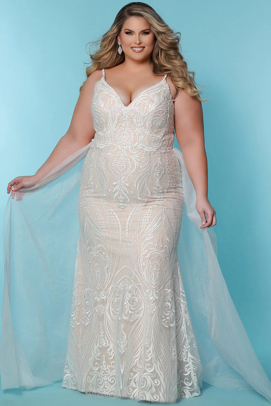 Sydneys Coset SC5287 Jolene Plus Size Bridal Dress. The Sydneys Coset SC5287 Jolene Plus Size Bridal Dress features an opulent, intricate bodice and cascading layers of matte chiffon on the skirt. Its timeless silhouette is cut to flatter the female form, and create an elegant statement as you take your place at the altar. This exquisite dress is designed exclusively for the plus size bride and is sure to make a lasting impression on your special day.