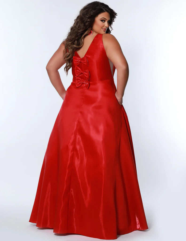 Sydney's Closet SC7356 A-Line Skirt With Pockets V-Neck Cut Outs Paris Satin Plus Size Prom Dress. Make an entrance in Sydney's Closet SC7356 A-Line Skirt! This surprisingly sassy plus-size prom dress flaunts flared pockets plus v-neck cut outs, with Paris satin fabric to finish off the perfect night-out look. Dare to be noticed!