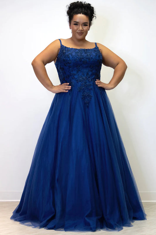 Sydney's Closet SC7357 A-Line Scoop Neck Tulle Lace Appliques Plus Size Prom Dress.  You'll be the belle of the ball in Sydney's Closet SC7357 A-Line Prom Dress! Flattering A-line skirt with scoop neck and lace appliques make you look like a real star. Get ready to dazzle in this plus size stunner! #HollaIfYouHeardItHereFirst