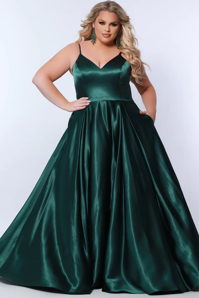 Sydney's Closet SC7363 Satin A-Line Silhouette With Pockets Sweetheart Neckline Spaghetti Strap Plus Size Prom Dress. For all your prom dreams, the Sydney's Closet SC7363 is where it's at! This show-stopping satin dress features a sweetheart neckline, spaghetti straps, and A-line silhouette with handy pockets. Plus-size perfection for any special event! Dare to dazzle!