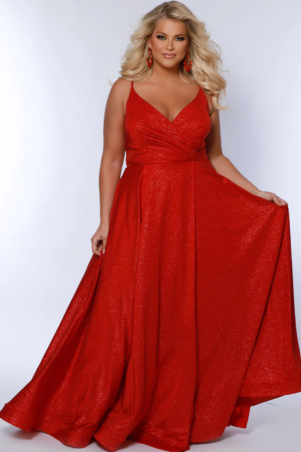 Look your best in our Sydney's Closet SC7375 Long Prom Dress - a beautiful A-line plus-size with a shimmering look an alluring maxi slit, and a formal gown silhouette that is perfect for any special event. The dress offers a flattering fit for all body types. All eyes are on you when you sparkle in this fabulous formal gown designed for women with real curves.