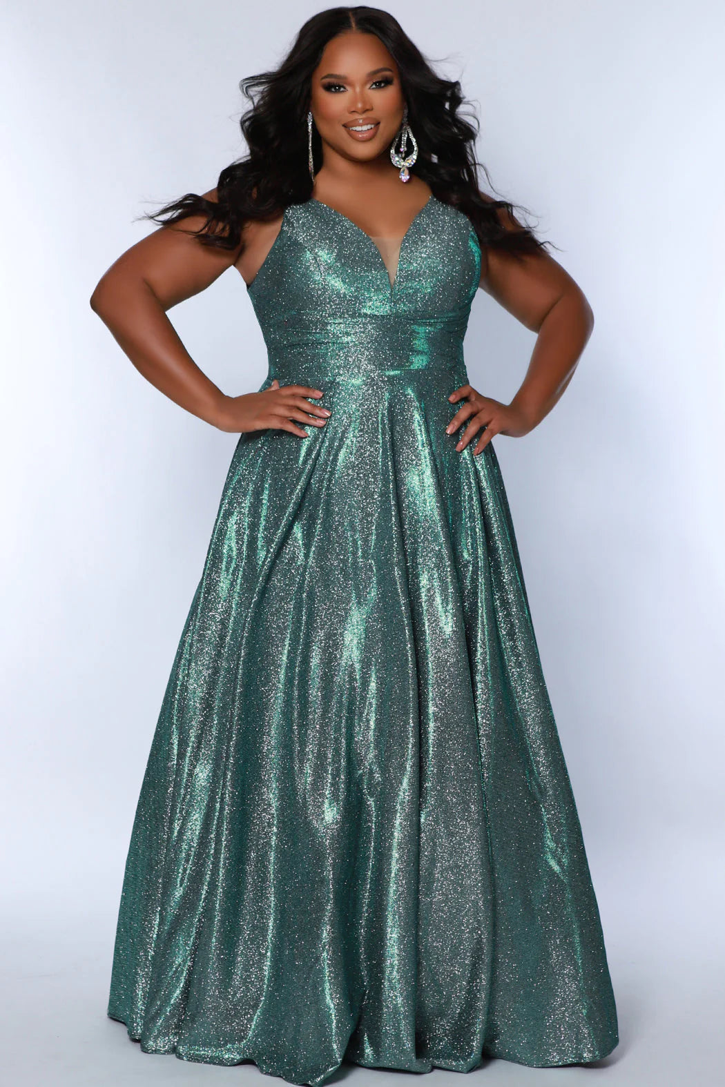 The Sydneys Closet SC7378 Long Prom Dress is perfect for plus size women who want to make a statement. With its V-neckline, A-line silhouette, and two side pockets, this formal gown is sure to turn heads. Crafted from high-quality materials for a comfortable fit, this dress is ideal for special events like proms and pageants. Look no further than our Secret Treasure plus size evening gown to look glamorous at Prom 2024 or the next formal occasion coming up on your calendar.  