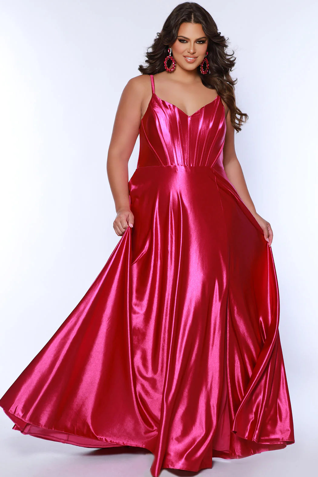 This elegant Sydneys Closet SC7380 Long Prom Dress is designed with a Plus Size V Neck silhouette, crafted from luxurious Satin. Featuring an A-Line corset bodice and long floor length skirt, this timeless Formal Gown is perfect for any special event or pageant. You're both gorgeous and glamorous when you wear this "Sweet in Satin" long formal gown to Prom 2024 or your next fancy evening event. 