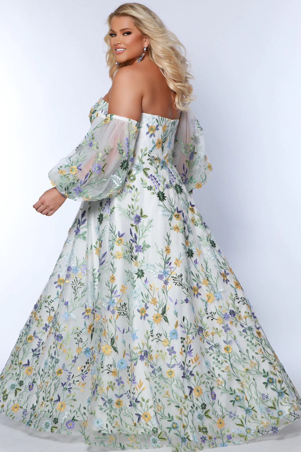 This Sydneys Closet SC7381 long prom dress is perfect for formal occasions or special evenings out. Featuring a plus size A-line silhouette, a sweetheart neckline, and a striking floral pattern, this stylish dress is sure to bring a touch of elegance and glamour to your look. Unleash your romantic side in our 'Watch Me Bloom' formal dress! 