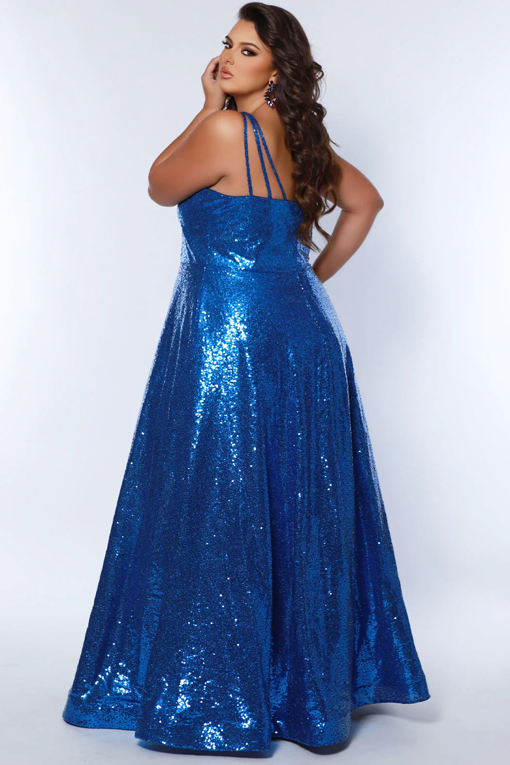 Make a statement in the Sydneys Closet SC7387 Plus Size Sequin A-Line Prom Dress. This beautiful formal gown features beaded sequin detailing, a flattering scoop neckline, and an elegant A-line silhouette. Perfect for prom, pageants, and other special occasions. Sparkle all night long when you wear this long evening gown to Prom or any other formal event on your social calendar that calls for the glamour of overall sequins.