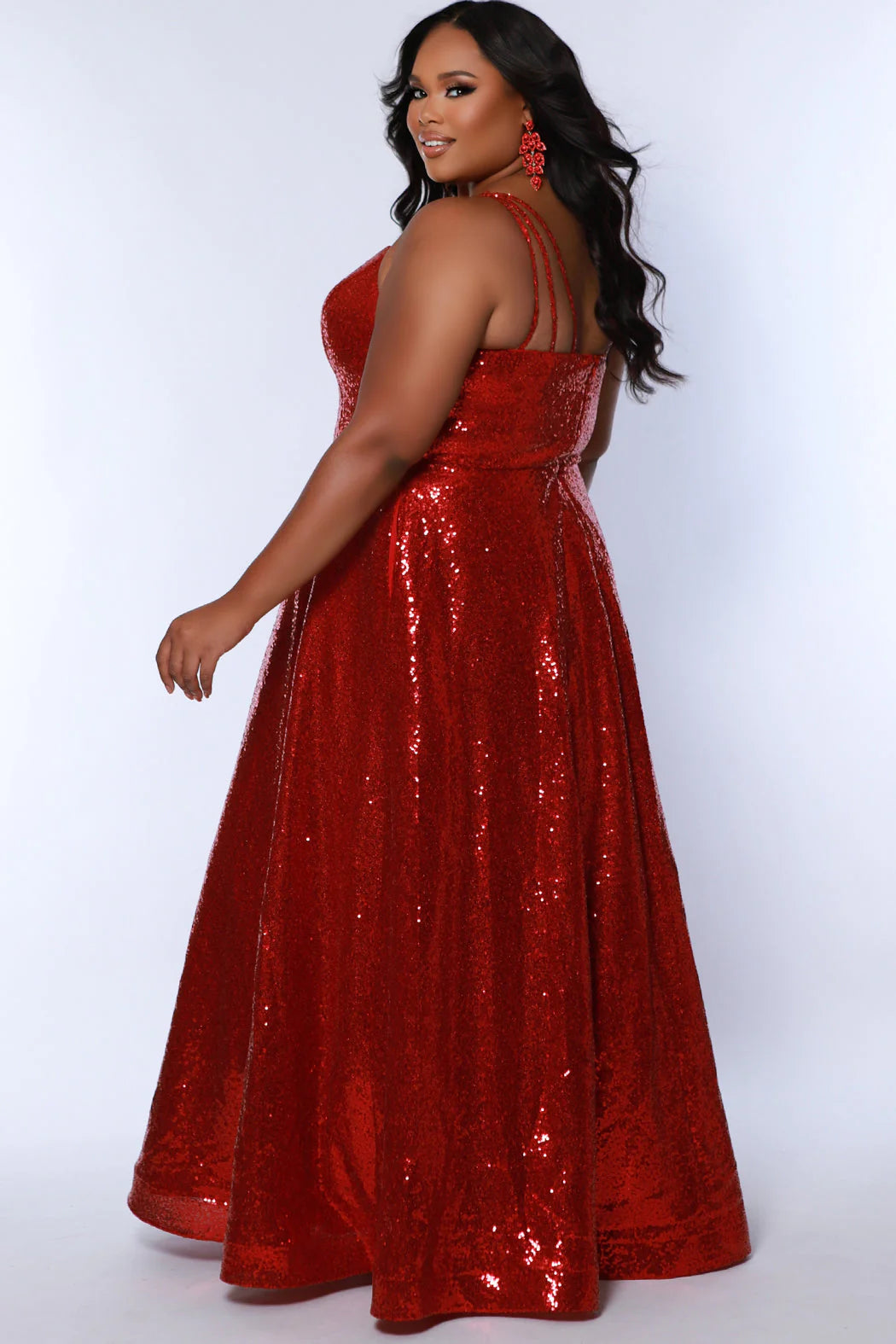 Make a statement in the Sydneys Closet SC7387 Plus Size Sequin A-Line Prom Dress. This beautiful formal gown features beaded sequin detailing, a flattering scoop neckline, and an elegant A-line silhouette. Perfect for prom, pageants, and other special occasions. Sparkle all night long when you wear this long evening gown to Prom or any other formal event on your social calendar that calls for the glamour of overall sequins.