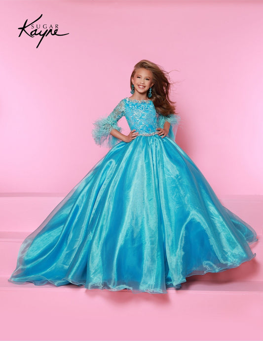 The Sugar Kayne C338 Preteen Pageant Dress is an elegant A-line ballgown featuring sequin and feather sleeves. Featuring the highest quality materials, this dress is perfect for special occasions and is sure to make your child feel like a princess. Experience twinkling elegance in this Metallic Organza Ballgown. The feathered sleeves are designed to make you feel like royalty.