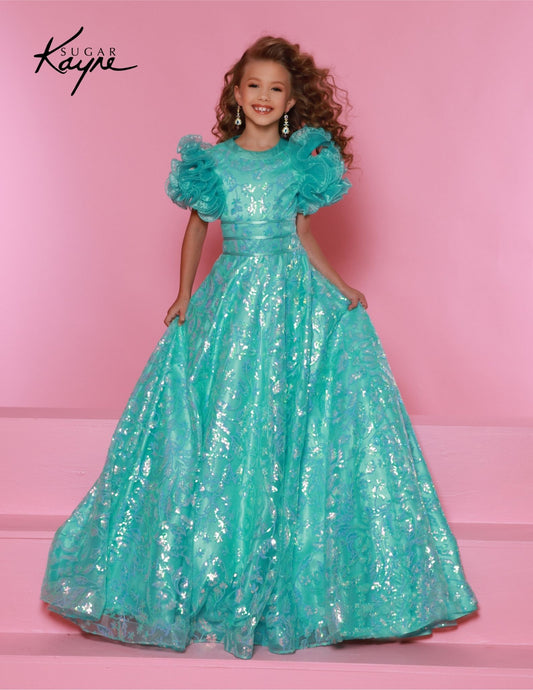 The Sugar Kayne C340 Long Girls Preteen Pageant Dress is an elegant A-line ballgown with exquisite sequin and ruffle sleeves. Crafted from beautiful fabric, this dress is perfect for any special occasion. Dance under the stars in this darling sequin mesh ballgown. The graceful ruffle sleeves create a magical and charming look.