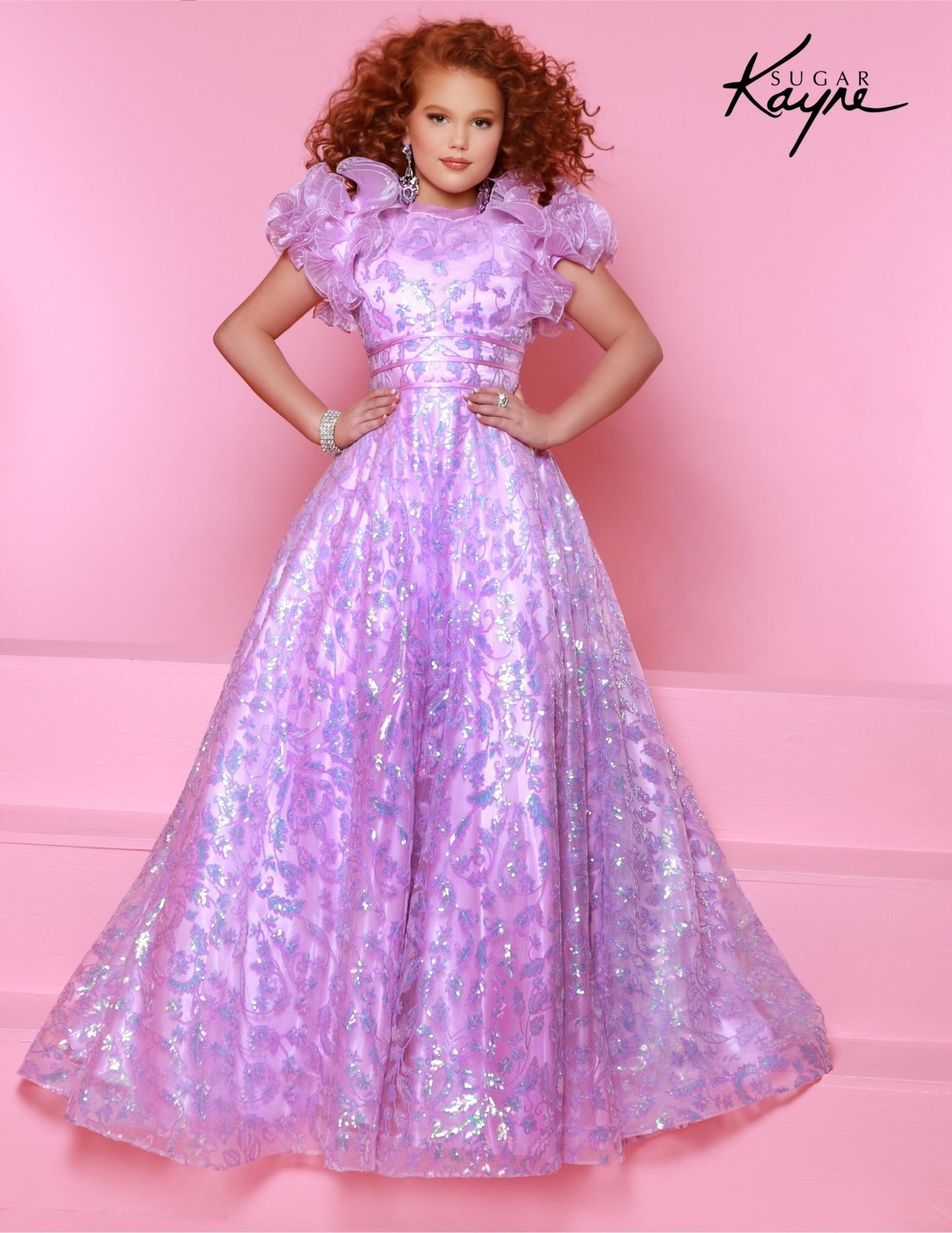 The Sugar Kayne C340 Long Girls Preteen Pageant Dress is an elegant A-line ballgown with exquisite sequin and ruffle sleeves. Crafted from beautiful fabric, this dress is perfect for any special occasion. Dance under the stars in this darling sequin mesh ballgown. The graceful ruffle sleeves create a magical and charming look.