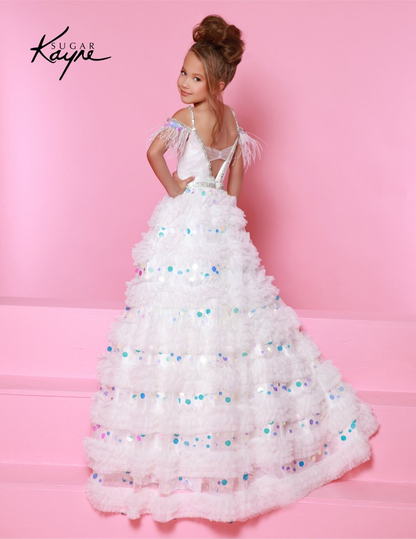 Sugar Kayne C342 is a long layered ruffled A-line ballgown designed specifically for preteen girls who want to make a statement. This one of a kind dress features off-shoulder details and feathers for an added touch of elegance. Perfect for any pageant or special occasion. Dress like the true princess you are! This enchanting mesh ballgown featuring ruffles on the skirt is designed to make you shine bright on the stage!