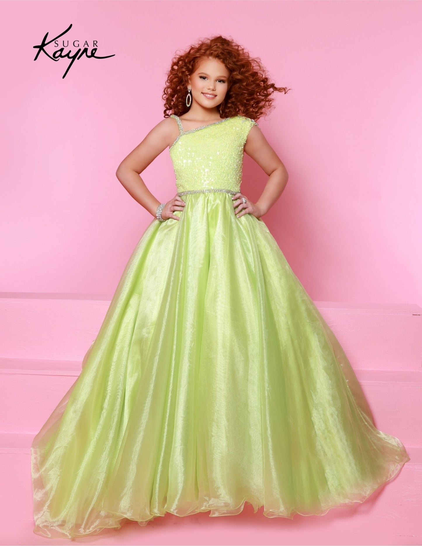 Sugar Kayne C348 is a stylish and elegant long girls preteen pageant dress. It has an A-line silhouette with a one-shoulder ballgown sequin top and train. Special details include a sequin-encrusted neckline for a beautiful finish. Perfect for any special occasion. Become the dazzling diva you are! This Sequin Mesh and Poly Organza Ballgown skirt is perfect for pageant competitions and winning hearts.