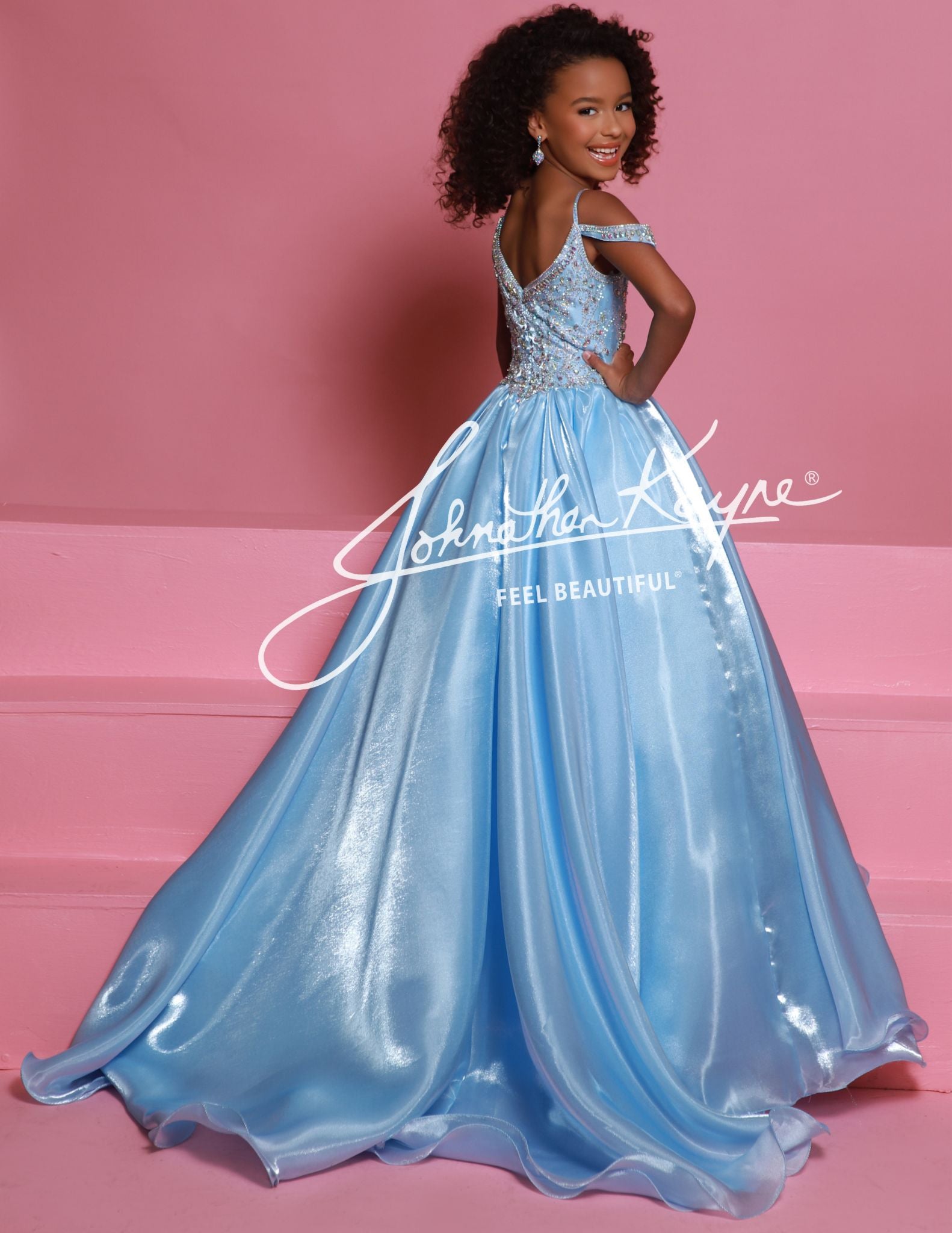Dress your little girl like a princess in the Sugar Kayne C365 Mirror Organza Girls Preteen and Teen Pageant Dress. The off-the-shoulder design and embellished bodice will make her stand out from the crowd. Made with high-quality mirror organza, this dress will make her feel like a true pageant winner.&nbsp; Elevate your child's pageant look with the Sugar Kayne C365 Organza Girls Pageant Dress. The off-the-shoulder design and crystal bodice add a touch of elegance and sparkle. Made from high-quality organz