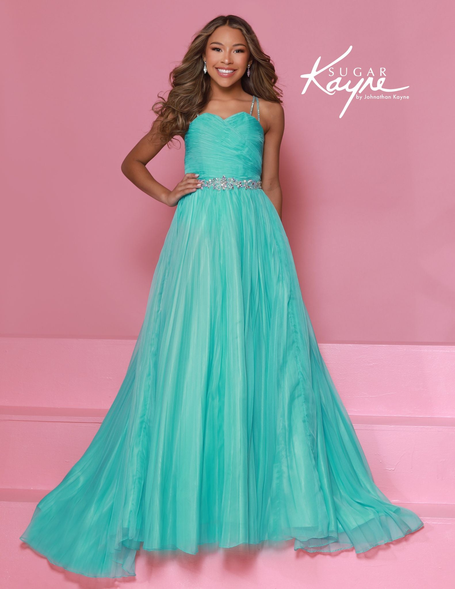 Sugar Kayne C395 Chiffon Girls A Line Pageant Dress High Neckline Cascading Crystal Back

Elevate your young pageant star in the Sugar Kayne C395, a stunning A-line dress crafted from flowing chiffon. The sophisticated sweetheart neckline creates an elegant silhouette, while the breathtaking cascading crystal back catches every spotlight. This showstopping gown combines timeless grace with dazzling details, ensuring your contestant stands out on stage and creates unforgettable moments that judges will remem