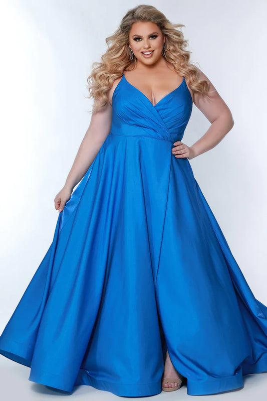 Sydney's Closet Tease Prom TE2103 Surplice Neckline A-Line Fitted Satin Lining Plus Size Prom Dress. Look exquisite for your special occasion in Sydney's Closet's TE2103 dress. Featuring a sophisticated surplice neckline, a flattering A-Line silhouette, and luxurious satin lining, this dress will be sure to make you feel like royalty on your big night. Achieve an elegant and eye-catching look that will make memories for years to co
