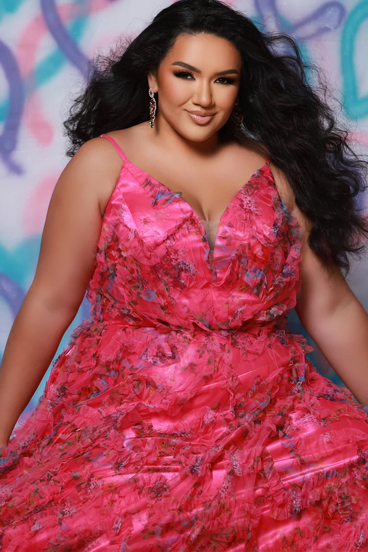 Step into the spotlight with Sydney's Closet TE2508, a bold Size 22 pink A-line gown designed to turn heads. Its daring V-neckline and playful ruffle print combine elegance with confident flair, making it the perfect choice for prom or formal nights. Embrace your curves while enjoying a graceful silhouette that moves with you—this dress is your ultimate statement of fearless style.

Size: 22

Color: Pink