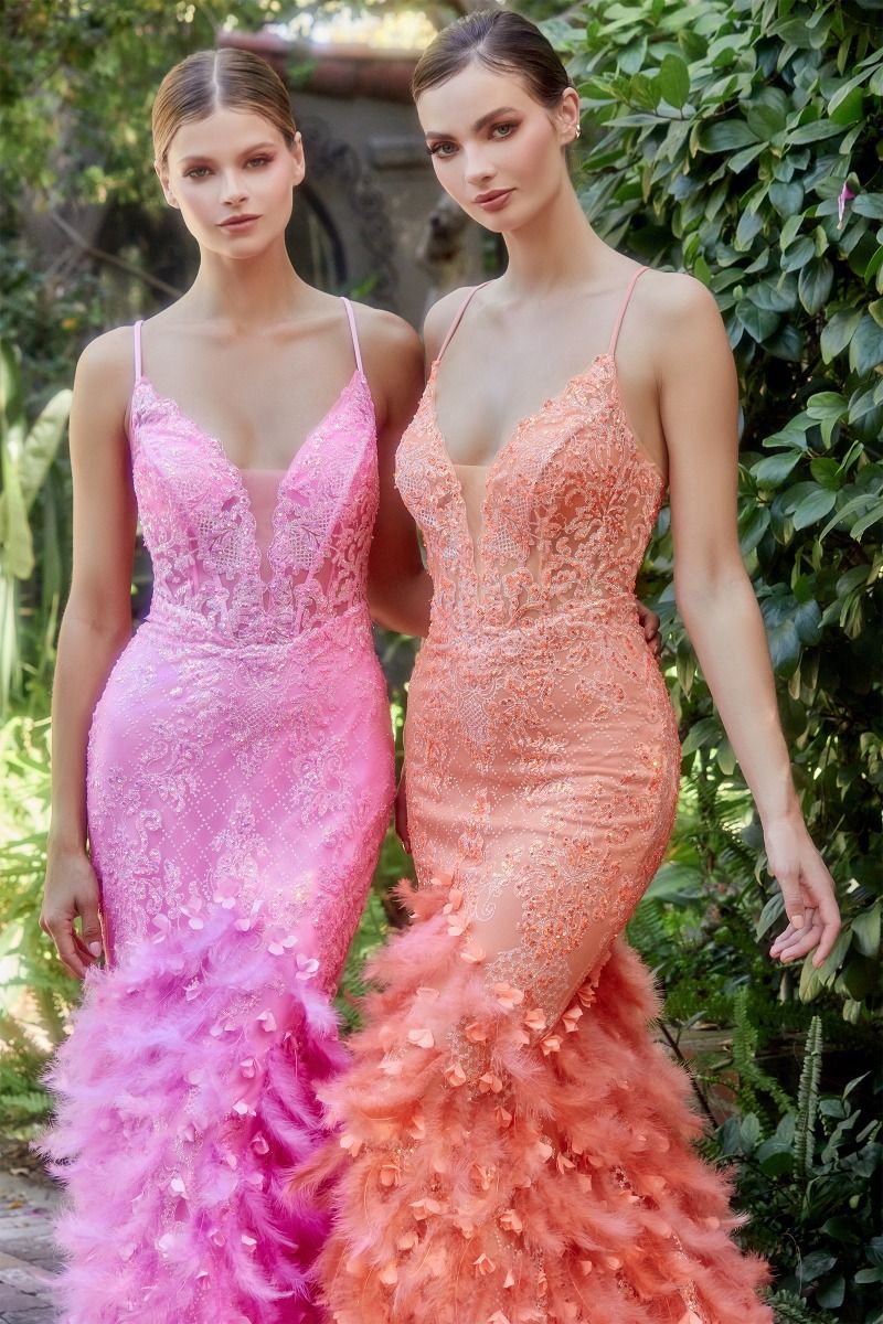 Andrea & Leo Couture A1116 Long Sheer Mermaid Feather Prom Dress Formal Gown 3D Lace This fitted dress is adorned with a floral beaded lattice print and a feather lace train with dimensional floral appliques. The mermaid silhouette of the dress hugs the body and flares out at the knees, creating a flattering and elegant shape. The lace up corset back allows for adjustable sizing and the thin straps provide a feminine and delicate touch. 