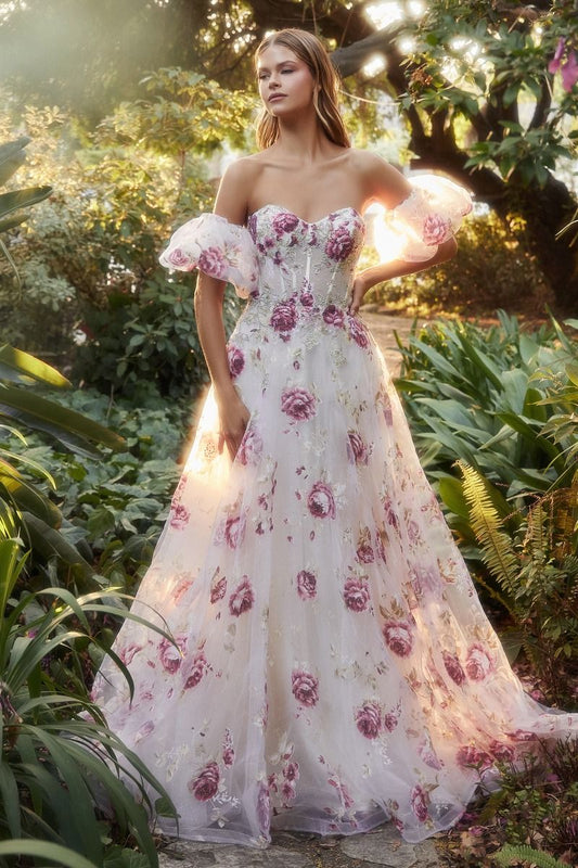 Elevate your formal attire with the Andrea & Leo Couture A1133 Floral Print A Line Prom Dress. The crystal embellished bodice adds a touch of glamour to the classic floral print, while the puff sleeves and sheer corset exude elegance. Perfect for any special occasion, this dress combines style and sophistication in one stunning design. This strapless organza peony print ball gown is a breathtaking and romantic choice for any fairytale garden. 