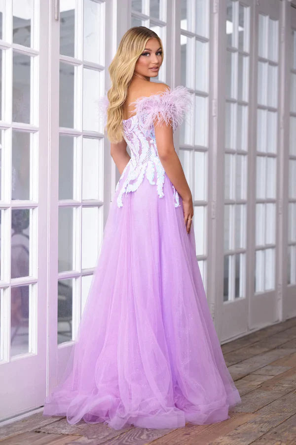 This elegant A Line gown by Ava Presley is the perfect choice for your next formal event. The shimmering fabric is complemented by a gorgeous off the shoulder Feather straps with a sweetheart neckline, an iridescent sequin bodice and shimmering skirt ensuring you look and feel your best on the big night. Ava Presley 39213   Sizes: 00-24  Colors: Iridescent Lilac, Iridescent Light Blue