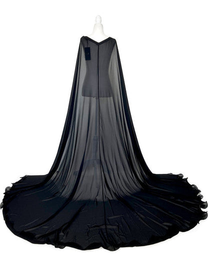 Elevate your formal look with the Marc Defang 2011 Long Chiffon Formal Pageant Cape. This detachable cape features 2 panels for a customizable fit and a stunning chiffon fabric that will flow gracefully as you move. Perfect for pageants, this cape adds that extra touch of elegance to your ensemble.   Ladies ONE SIDE FITS ALL