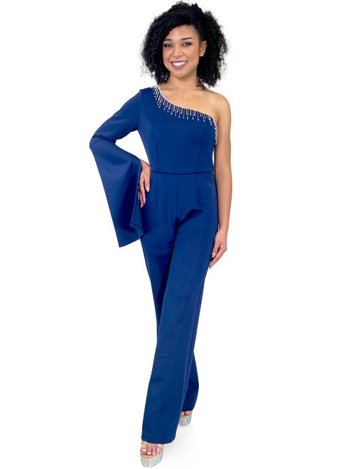 Enhance your evening look with Marc Defang's 8267 Pageant Jumpsuit. This elegant design features a one-shoulder neckline, One long bell sleeves, a crystal fringe detail and a fitted silhouette. Update your wardrobe with this fashionable and flattering piece.  Sizes: 00-16  Colors: Hot Pink, Royal Blue, Neon Green, Light Blue, Black  Contact us for custom colors - Allow 30 days Production