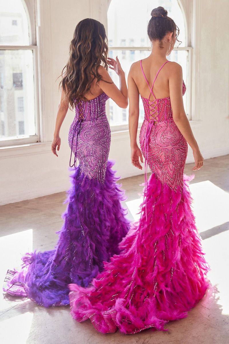 Expertly crafted for proms and pageants, the Ladivine cc2308 dress features a sheer glitter corset that accentuates your figure while adding a touch of glamour. The feather mermaid silhouette adds graceful movement and elegance. You'll be the star of any event with this stunning evening gow