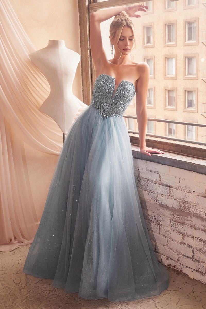 For a showstopping look, this exquisite gown from Ladivine is perfect for special occasions. Crafted from glittering sequins with tulle layers, it features a V-neckline with a strapless design and a classic ballgown silhouette. Perfect for prom or a formal event. Are you dreaming of a magical prom night? Make your prom dress dreams come true with this gorgeous strapless A-line dress. 