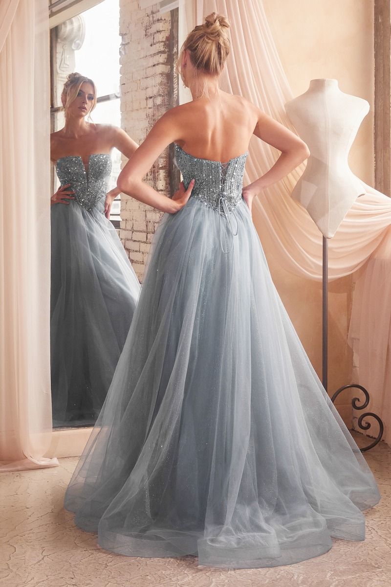 For a showstopping look, this exquisite gown from Ladivine is perfect for special occasions. Crafted from glittering sequins with tulle layers, it features a V-neckline with a strapless design and a classic ballgown silhouette. Perfect for prom or a formal event. Are you dreaming of a magical prom night? Make your prom dress dreams come true with this gorgeous strapless A-line dress. 