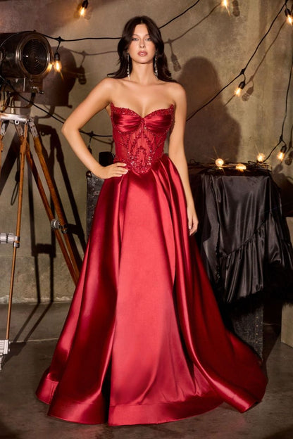 Ladivine CD389 Beaded Sheer Corset Prom Dress Formal Gown This stunning A-line formal gown features an intricately beaded sheer corset bodice with a sweetheart neckline that commands attention. Structured pleated cups provide elegant support and definition, while the flowing skirt offers graceful movement. Functional side pockets add practical sophistication—a rare luxury in formal wear. The delicate beadwork catches light beautifully, creating an editorial-worthy silhouette perfect for prom, galas, or blac