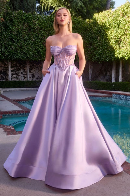Ladivine CD389 Beaded Sheer Corset Prom Dress Formal Gown This stunning A-line formal gown features an intricately beaded sheer corset bodice with a sweetheart neckline that commands attention. Structured pleated cups provide elegant support and definition, while the flowing skirt offers graceful movement. Functional side pockets add practical sophistication—a rare luxury in formal wear. The delicate beadwork catches light beautifully, creating an editorial-worthy silhouette perfect for prom, galas, or blac
