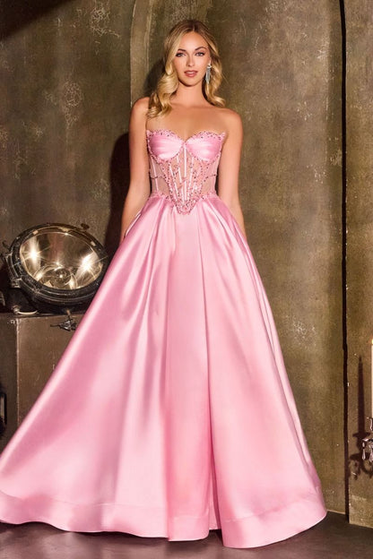 Ladivine CD389 Beaded Sheer Corset Prom Dress Formal Gown This stunning A-line formal gown features an intricately beaded sheer corset bodice with a sweetheart neckline that commands attention. Structured pleated cups provide elegant support and definition, while the flowing skirt offers graceful movement. Functional side pockets add practical sophistication—a rare luxury in formal wear. The delicate beadwork catches light beautifully, creating an editorial-worthy silhouette perfect for prom, galas, or blac