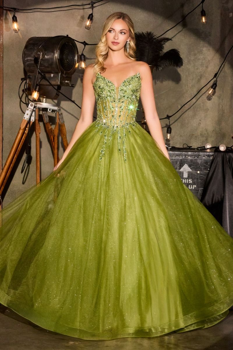 Elevate your prom night with the Ladivine CD721, a strapless A-line gown that commands attention. The plunging sweetheart neckline frames your silhouette beautifully, while intricate crystal embellishments adorn the corset bodice for a touch of glamour. The flowing skirt creates an elegant silhouette that moves gracefully across the dance floor, and the dramatic train adds a finishing flourish of sophistication. Perfect for those seeking a show-stopping formal look that balances modern edge with timeless el