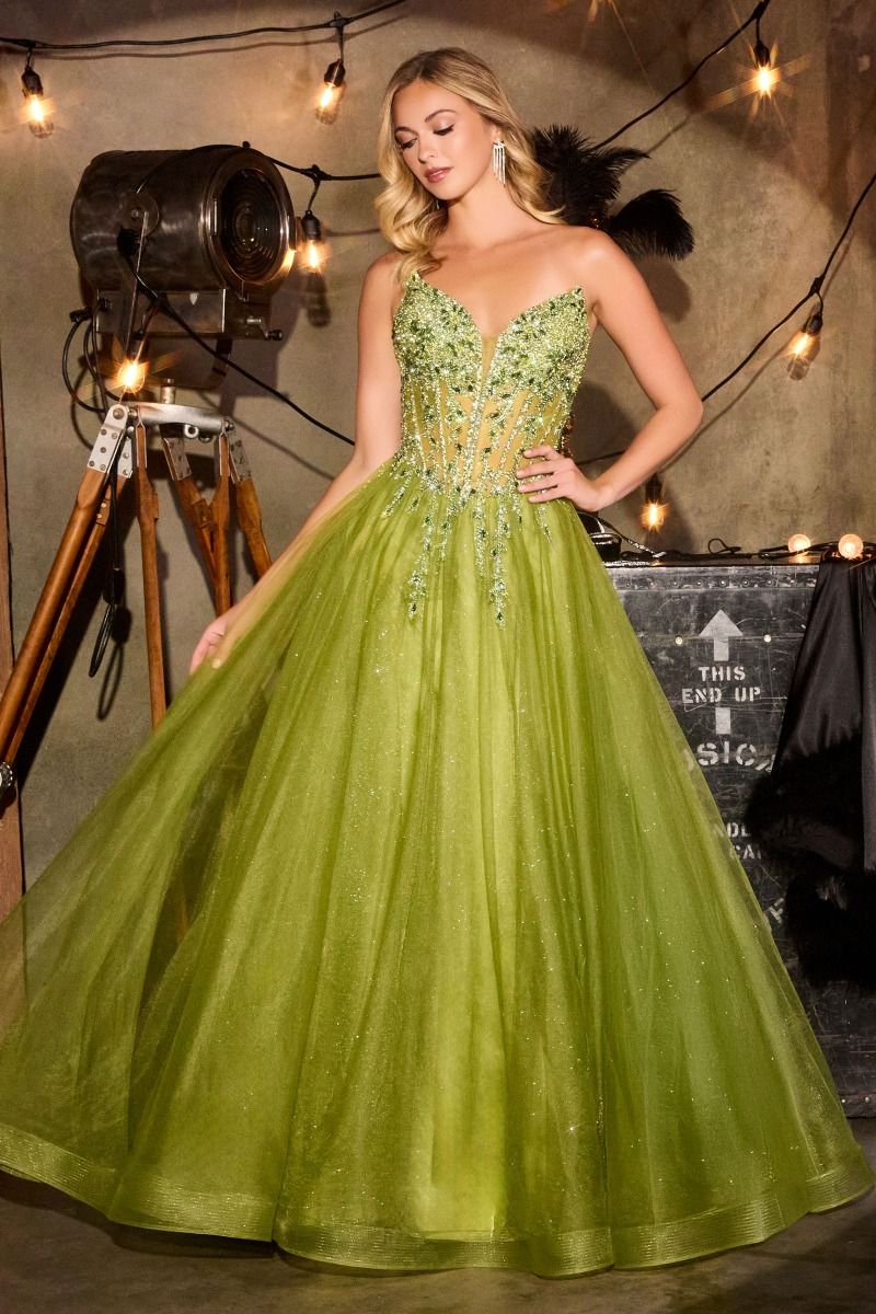 Elevate your prom night with the Ladivine CD721, a strapless A-line gown that commands attention. The plunging sweetheart neckline frames your silhouette beautifully, while intricate crystal embellishments adorn the corset bodice for a touch of glamour. The flowing skirt creates an elegant silhouette that moves gracefully across the dance floor, and the dramatic train adds a finishing flourish of sophistication. Perfect for those seeking a show-stopping formal look that balances modern edge with timeless el