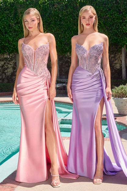Elevate your prom night with the Ladivine CD722, a stunning gown designed to turn heads. This sophisticated dress features a sheer corset bodice that creates an alluring silhouette, paired with a romantic sweetheart neckline for timeless elegance. Intricate beading adorns the bodice, catching light with every movement, while the dramatic slit train adds modern flair and graceful movement. Perfect for those seeking a show-stopping formal look that balances classic romance with contemporary style.

Silhouette