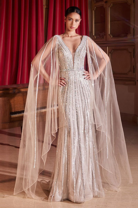 Turn heads at your next formal event with this glamorous, fitted Andrea & Leo Couture CD865 long shimmer formal dress. With its sheer cape sleeves detailed with rhinestone embellishment, deep v-neckline, and open v-back, this sparkling column silhouette is sure to make a statement. Crafted from glitter flocked tulle with a rhinestone and beaded linear pattern, this is the perfect show-stopping look for weddings, black tie events, and more.  Sizes: 6-20  Colors: Platinum 