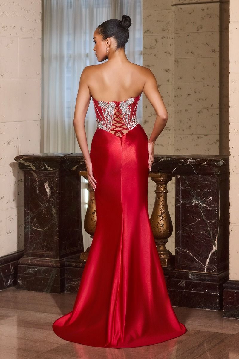 Elevate your prom night with the Ladivine CDS546, a stunning strapless gown designed to turn heads. This sophisticated dress features a sheer crystal-embellished corset bodice that creates a flattering silhouette, paired with a sweetheart neckline for timeless elegance. The dramatic slit train adds movement and glamour as you walk. Perfect for those seeking a show-stopping formal look that balances structure with refined detail.

Silhouette:&nbsp;Fitted
Design:&nbsp;Strapless sweetheart neckline with illusi