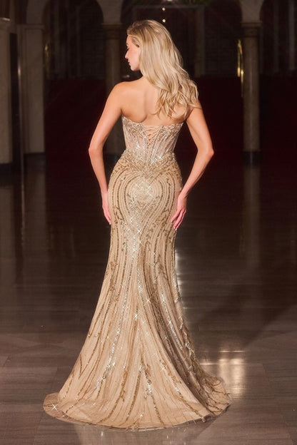 Ladivine CDS557 Strapless Beaded Sheer Corset Prom Dress This stunning Ladivine gown features a structured strapless design with an intricate beaded sheer corset bodice that commands attention. The sweetheart neckline elegantly frames the shoulders, while the beadwork creates a luminous focal point. A graceful train extends from the waist, adding dramatic movement and formal sophistication. The corset construction provides refined support and a sculpted silhouette ideal for prom, formal galas, or black-tie 